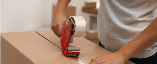 Man storing items in a box